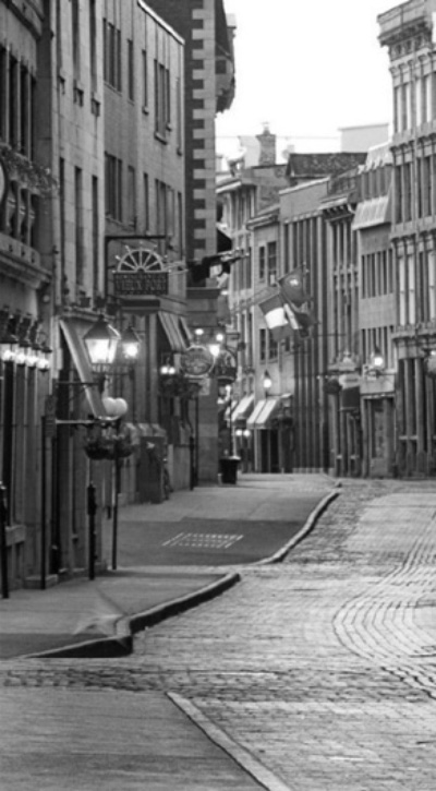 a writer’s cozy workspace with manuscripts